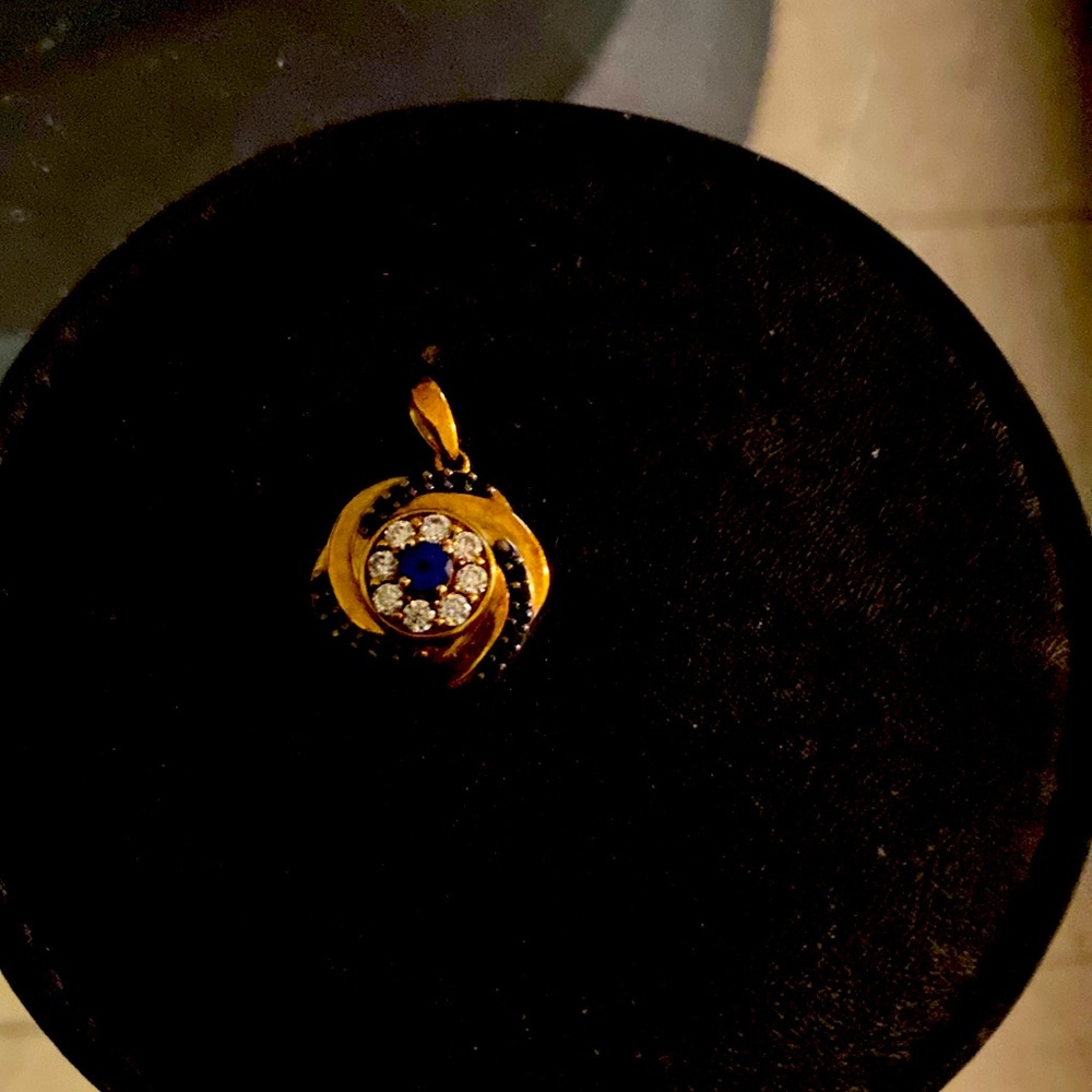 Sashmirk Kyanite multi gemstone, evil eye protector, pendant.